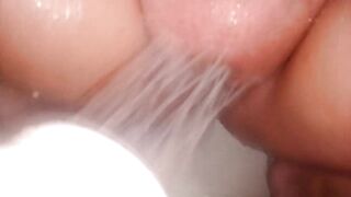 Washes her pussy in the shower.